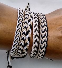 Hemp Bracelet or Anklet Braided in White, Natural, & Black.  Choose from 5 different designs of varying widths & patterns See photos for each: Traditional = 6mm wide Fishtail =  5mm Center Black = 9mm Feathered = 9mm Half Inch = 12mm Braided with 1 mm hemp cord For best results choose the size that equals your wrist or ankle size.  Then tell me if you want Skin Tight (adds 0 in)  Wiggle Room (adds 1/4 in) Braided to the measurement of the size selected knot to knot.  2 additional inches of loose Casual Black Woven Friendship Bracelets, Casual White Woven Braided Bracelets, Casual White Woven Braided Bracelet, Adjustable White Braided Beaded Bracelets, White Braided Bracelets For Festivals, Sliding Knot Bracelet, Hemp Bracelet, Hemp Jewelry, Hemp Bracelets