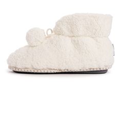 Keep warm and cozy with MUK LUKS® Lelilani Bootie Slippers. Easy pull-on style, infused with Vitamin E. Pom detail and durable indoor/outdoor sole makes this full coverage bootie a classic cold weather favorite. Machine wash on gentle cycle, no bleach, tumble dry low heat. Pull on Memory Foam Insole Cloud Lining Infused with Vitamin E Cloud Collection Available in Women's US sizes S (5-6), M (7-8), L (9-10), XL (11-12) White Casual Slippers With Soft Texture, Casual White Slippers With Soft Texture, Super Soft Slippers For Winter Lounging, Winter Super Soft Slippers For Lounging, Super Soft Slippers For Lounging In Winter, Super Soft Winter Slippers For Lounging, Cozy Winter Slippers With Round Toe, Winter Loungewear Slippers With Round Toe, Comfy Indoor Slippers