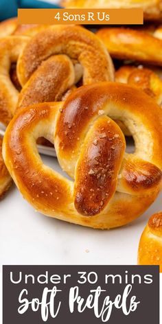 some pretzels are sitting on a table with the words under 30 mins soft pretzel