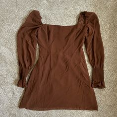 Brown Dress With Long Sheer Sleeves From Aritzia In A Size 6! I Missed The Return Window So It Is New With Tags. Super Cute Style, The Color Just Didn’t Work For Me. Please Note That It Is Brown Not Pink The Color Of The Mode(I Couldn’t Find Photos Of The Brown Color On The Aritzia Website) Fitted Long Sleeve Lined Mini Dress, Fitted Long Sleeve Mini Dress With Lining, Fitted Brown Mini Dress With Square Neck, Brown Fitted Mini Dress With Square Neck, Solid Color Flowy Mini Dress For Date Night, Brown Square Neck Dress For Date Night, Brown Fitted Square Neck Dress, Brown Square Neck Mini Dress For Brunch, Brown Smocked Back Dress For Brunch