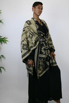 This gorgeous shawl is an easy throw and go addition. It’s tribal elements are woven into the garment. Great way to add a cozy, yet stylish finish to any outfit. Choose the black side or tan side…either way you are sure to look culturally chic. Belt not included. One Size Fits All Black Side, Hottest Trends, One Size Fits All, Shawl, That Look