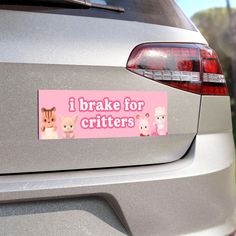 a bumper sticker that says i brake for critters on the back of a car