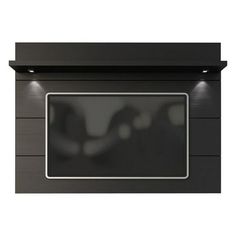 a black wall mounted oven with lights on it