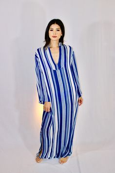 Low front, bell sleeve, maxi caftan. Deadstock semi-sheer blue & white rayon & cotton blend fabric. No lining. Striped Long Sleeve Maxi Dress For Vacation, Chic Blue Kaftan For The Beach, Blue Long Sleeve Maxi Dress For Beach, Blue Chic Kaftan For Summer, Striped Kaftan For Spring Vacation, Chic Blue Kaftan For Summer, Blue Maxi Dress For Daywear, Blue Long Sleeve Maxi Dress For Vacation, Bohemian Striped Long Sleeve Kaftan