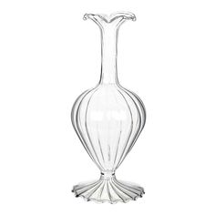 a clear glass vase sitting on top of a table