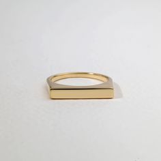 Rectangle Signet Ring, Geometric Engravable Solid Gold Ring, Stackable Gold Ring, Minimal Curved Signet Ring, Flat & Simple Stacking Ring Description: Discover the perfect blend of elegance and versatility with this rectangle signet ring. Crafted from solid gold, it features a geometric design and minimal curved edges, making it ideal for engraving. Stackable and simple, this flat band ring offers timeless style and modern sophistication. Product details: Ring Details :  Metal : Solid Gold ( 9k,14k,18k Yellow, Rose, White Gold) Band Width : 1.8mm  Ring size - US 3 to US 10 (for smaller or larger ring size, please contact) Please select your size at the drop down menu.  All orders below $250 will be shipped via Priority mail with tracking number.  All orders of $250 and above will be shippe Rectangle Signet Ring, Simple Stacking Rings, Ring Geometric, Ring Minimal, Gold Rings Stackable, Solid Gold Ring, Etsy Gold Ring, Geometric Ring, Detailed Ring