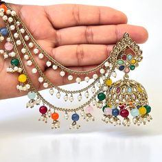 Restocked Bahubali Polki Pearl Jhumka/stone Jhumka/Indian Jewelry/Pakistani/Punjabi/Indian/Statement earring/Bridal earring/Indian wedding Can be paired with any dress Closure: Pushback This is 100% Handmade jewelry. So Color, shades, texture displayed may slightly vary from the actual product due to digital image limitations. We request you to consider these minor variations. Please expect the possibility of some slight imperfections when buying hand made jewelry. If you have any questions, please message or email us. Arrives in gift box. Please let me know if you have any questions. Thank you so much visiting my shop. Bohemian Chandbali Jhumkas With Stone Work, Multicolor Kundan Jhumkas With Cutdana, Heavy Multicolor Dangle Jhumkas, Multicolor Chandbali Jhumkas For Navratri, Multicolor Chandbali Jhumkas With Latkans, Multicolor Chandbali Jhumkas For Diwali, Multicolor Stone Work Jhumkas For Wedding, Multicolor Heavy Chandbali Bridal Earrings, Navratri Multicolor Chandbali Jhumkas