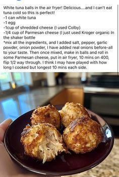 a person holding a plate with food on it in front of a window and an article about how to cook chicken balls