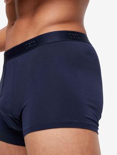 Our Jack boxer briefs in navy are cut for a streamlined, classic look with a fitted hipster shape, closed front and a shorter leg. A fabric-covered waistband provides gentle skin contact. Crafted from an ultra-soft blend of 92% Pima cotton and 8% elastane for added stretch, they're the ideal choice for sleeping, lounging and all-day wear. The model is 6'3" / 190cm tall with waist size 31” / 79cm, chest size 39” / 99cm. He wears a size Medium. Rose Cookies, Derek Rose, Mens Trunks, Navy Man, Short Legs, Boxer Briefs, Chest Size, Fabric Covered, Pima Cotton