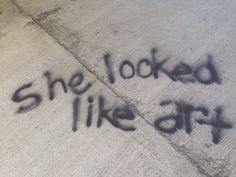 graffiti written on the sidewalk says she looked like art