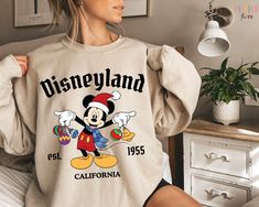 Disneyland Christmas Sweatshirt,Christmas Family Sweater, Disneyland Vintage Shirt, Mickey and Friends Christmas Shirt,Disney Crewneck Shirt 🎉 Welcome to FashionTeeTX! At FashionTeeTX, we offer a wide variety of custom T-shirts, sweatshirts, and hoodies perfect for your loved ones on all your special occasions. Whether you're looking for the ideal gift for birthdays, holidays, or family events, we've got you covered with unique, high-quality designs. Our collection is crafted with care, combining style, comfort, and personal flair, making it perfect for any season. As we head into popular shopping periods like Christmas, Valentine's Day, Mother's Day, Father's Day, and even back-to-school season, our versatile apparel ensures you'll find the perfect fit for every occasion. From cozy hoodi Disney Christmas Sweater, Mickey And Friends Christmas, Disneyland Vintage, Disneyland Holidays, Family Sweater, Disney Crewneck, Disneyland Christmas, Friends Christmas, Vintage Disneyland