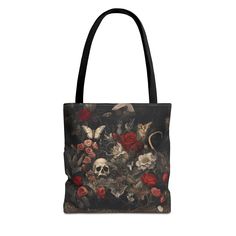 Step up your gothic style with the "Gothic Skull and Flower Print Tote Bag," a must-have accessory that combines dark elegance with everyday functionality. Featuring a hauntingly beautiful design of skulls entwined with delicate flowers, this tote bag is the perfect addition to your alternative wardrobe. Whether you're heading to the market, hitting the beach, or just need a stylish carryall, this tote has you covered. Available in three sizes, this bag is designed to fit your lifestyle. Made from 100% spun polyester with a medium-weight fabric (6.49 oz/yd², 200 g/m it's highly durable and built to withstand daily use. The all-over print is created using dye sublimation, delivering vivid visuals that stay bold no matter how much you carry. Double-stitched seams and a nonwoven laminate lini Gothic Black Bags For Alternative Fashion, Gothic Shoulder Bag For Everyday Use, Gothic Black Bag For Alternative Fashion, Gothic Shoulder Bag For Alternative Fashion, Gothic Black Shoulder Bag With Skull Print, Gothic Halloween Bags For Alternative Fashion, Gothic Bags For Halloween, Gothic Mode, Dark Elegance