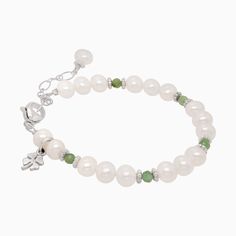 She is one lucky little lady! Celebrate her good fortune with her very own tiniest shamrock charm bracelet. It's absolutely adorable and is surrounded by her very special birthday gemstone, twinkly daisies, and genuine cultured freshwater pearls. The tiniest clover charm...ever is included. [split] Details about your bracelet: Real freshwater pearls and sterling silver The tiniest sterling silver shamrock clover charm...ever! about 5mm across Celebrate her special day and choose her birthday gem Elegant Good Luck Bracelets With Natural Stones, Elegant Birthstone Charm Bracelet For Birthday, White Charms Bracelets For Birthday Gift, Elegant Charm Bracelet For Birthday With Charms, Elegant Green Bracelet For Birthday, Pearl Charm Bracelet For Birthday, Elegant Jewelry With Natural Stones For Birthdays, Elegant Natural Stone Jewelry For Birthdays, Elegant Natural Stone Jewelry For Birthday