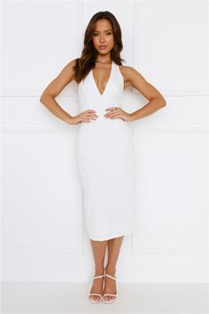 Length from bust to hem of size S: 111cm. Chest 37cm, Waist 32cm, across front only of size S. Midi dress. Lined. Model is a standard XS and is wearing size XS. True to size. Stretch to lining. V-neckline. Halter neck-tie. Open-back. Elasticised band to back. Textured. Zipper. Cold hand wash only. Polyester/Spandex. Steal the attention in the Party Life Halter Midi Dress. Featuring a V-neckline and an open-back with an elasticated band. Style it with heels to show off your confidence. Fitted V-neck Midi Dress For Casual Occasions, Stretch Mid-length Dresses For Date Night, Mid-length Stretch Dress For Date Night, Date Night Stretch Mid-length Dress, V-neck Midi Dress With Lined Fitted Bodice, Lined V-neck Midi Dress With Fitted Bodice, White V-neck Lined Midi Dress, V-neck Lined Midi Dress For Dress Down Occasions, Dressy White Knee-length Midi Dress