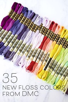 different colors of thread with the text, 35 new floss colors from dmc