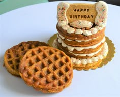 a stack of waffles sitting on top of a table next to each other