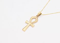 Hammered Cross Necklace made of Gold Vermeil: 18k Gold over Solid 925 Sterling Silver ☞ made to last. Matching Ring & Matching Earrings ☞ please ask me Details:• Dimensions: Pendant Height 32.5mm, Width 19.7mm• Free Complimentary Chain• 18k Gold Vermeil SKU TE-036 Elegant Ankh-shaped Gold Jewelry, Elegant 14k Gold Ankh Jewelry, Yellow Gold Cross Charm Jewelry, Gold Ankh Jewelry For Anniversary, Hallmarked Yellow Gold Ankh Jewelry, Elegant Ankh Yellow Gold Jewelry, Elegant Yellow Gold Ankh Jewelry, Symbolic Yellow Gold Cross Jewelry, Elegant Ankh-shaped Hallmarked Necklace