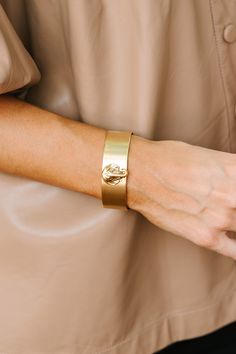 shop the mint, boutique clothing for women, trendy online boutique Everyday Gold Metal Cuff Bracelet, Gold Plated Cuff Bracelets, Chic Gold Cuff Bracelet With Oyster Detail, Chic Gold Oyster Bracelet Cuff, Chic Gold Oyster Cuff Bracelet, Gold Metal Cuff Bracelet With Oyster Design, Chic Gold Cuff Jewelry, Everyday Gold Cuff Bracelet, Adjustable Open Cuff Gold Jewelry