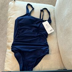 Questions? Leave A Comment Below! Blue Sleeveless Athleisure Swimwear, Fitted Blue One-piece For Poolside, Blue One-piece Swimwear For Workout, Blue Sleeveless One-piece For Pool, Blue One-piece Swimwear For Water Sports, Blue V-neck One Piece For Poolside, Adidas Track Suit, Cut Out One Piece, People Shopping