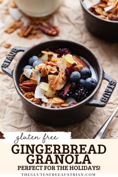 a bowl of granola with blueberries and pecans in it on a table