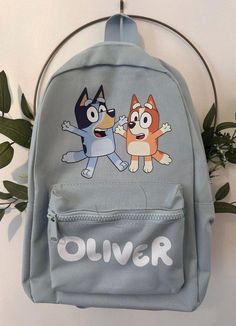 BEAUTIFUL 𝑀𝐼𝑁𝐼 𝐵𝐴𝐶𝐾𝑃𝐴𝐶𝐾  With the household favourite Bluey taken centre stage  Perfect for baby or toddler belongings, nursery bag, back to school, book bag, dance group  Bag colour Powder Blue  Size- 23x35x12 Aprox capacity 7litres Cute Blue Backpack For Back To School, Blue Cartoon Bags For Back To School, Blue Cartoon Backpack For Everyday Use, Blue Rectangular Backpack For School Events, Softback Bags For Back To School, Cartoon School Bags For End Of School Year, Back To School Softback Bags For School Events, Playful Softback School Bags, Character Style Backpack For End Of School Year