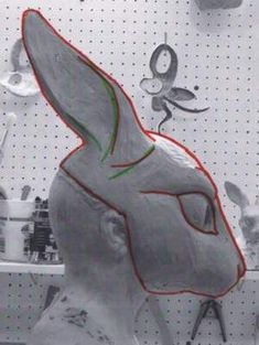 a drawing of a rabbit head on the wall