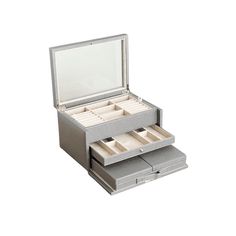 an open jewelry box sitting on top of a table