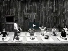 a group of people are doing yoga outside