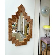 a mirror that is hanging on the wall