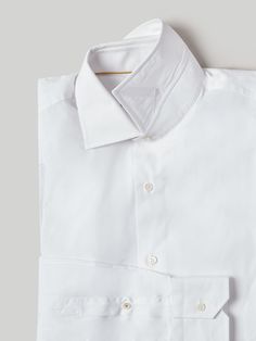 Designed in a modern fit, the Robert Talbott’s pinnacle dress shirt, the luxurious Craig Estate shirt is made in Italy and features our signature Monterey semi-spread collar with removable collar stays. Every construction detail, whether it’s the split back yoke or the lightweight pique neck channel, was explicitly chosen to enhance the way the shirt drapes, reduce bulk and optimize overall comfort.  So, whether you’re attending a board meeting as a lead investor or philanthropic adviser, this I Elegant Dress Shirt With Button Cuffs And Spread Collar, Luxury Shirt With Lapel Collar For Formal Occasions, Luxury Formal Shirt With Lapel Collar, Luxury Shirt With Lapel Collar For Formal Events, White Dress Shirt With Placket For Formal Events, Designer Slim Fit Dress Shirt For Formal Occasions, Luxury Spread Collar Shirt For Workwear, Elegant Slim Fit Shirt With Concealed Placket, Elegant Slim Fit Shirt With Hidden Buttons