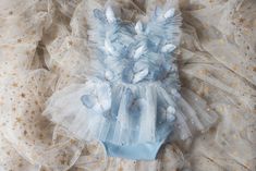 This is a listing for a romper/dress decorated with tulle ruffles with pearls and butterflies.  Sizes: The size is pretty flexible, it ties on the waist back area and it has an elastic.              6-9 month             9-18 month              Made to order (3-5 business days) All used materials are new. All items are made with care in a smoke/pet free environment. I would like to invite you to Your Dream Pix LLC VIP customers group!  Please, join us for all news and updates from my shop, new p Summer Ruffles Tulle Tutu Dress, Summer Tulle Tutu Dress With Ruffles, Summer Tulle Ruffles Tutu Dress, Summer Ruffled Tulle Tutu Dress, Whimsical Ruffled Tutu Dress For Summer, Whimsical Summer Tutu Dress With Ruffles, Whimsical Ruffled Tutu Dress For Spring, Summer Tutu Dress With Ruffles For Dress-up, Spring Wedding Tutu Dress With Ruffles