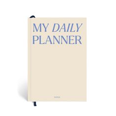 a book with the title'my daily planner'in blue on top of it