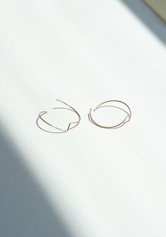 Delicate and sophisticated and everything we have come to expect from Kathleen Whitaker. The Large Moon Earrings are open hoop-like in style with a full moon shape. Sold as a pair. Need a second opinion? If you have special requests or just need advice, please reach out to hello@shop-vestige.com. 14kt Yellow gold. Handmade in Japan Modern Crescent Jewelry With Ear Wire, Modern Crescent Jewelry For Pierced Ears, Elegant Crescent-shaped Jewelry With Ear Wire, Handmade Elegant Hoop Earrings, Elegant Handmade Open Circle Hoop Earrings, Elegant Hand Forged Circle Earrings, Kathleen Whitaker, Reworked Vintage, Moon Shape