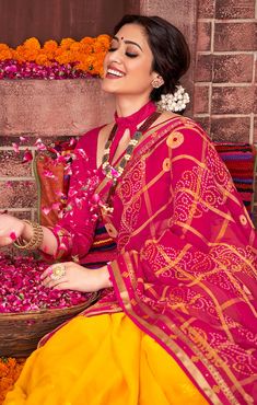 This Saree is Ready to Wear (With Fall and Pico Done). A designer saree in Magenta & Yellow color. It has intricate design all over the saree. This saree is a suitable amalgamation of style and grace that is required from an ethnic wear. The saree is ideal for any formal gathering. The saree comes with an unstitched blouse of corresponding color and design as shown in the picture. Georgette Designer Red & Yellow Color Saree Fabric Type: GeorgettePrimary Color: MagentaSecondary Color(s): - Yellow Pre-draped Georgette Saree For Puja And Eid, Festive Semi-stitched Pre-draped Saree For Puja, Festive Bandhani Print Georgette Pre-draped Saree, Fitted Pre-draped Saree With Dupatta For Puja, Festive Bandhani Print Georgette Salwar Kameez, Semi-stitched Bandhani Print Salwar Kameez In Georgette, Bollywood Style Dresses With Pallu For Puja, Navratri Bandhani Print Georgette Sets, Multicolor Bandhani Print Pre-draped Saree For Wedding