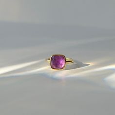 C R Y S T A L ∙ S T A T E M E N T ∙ R I N G This natural Amethyst crystal ring, embodies simple elegance and natural beauty. This piece features a large natural Amethyst stone on a elegant yet simple gold-plated brass ring.  Amethyst is a beautiful translucent purple stone is known for it's ability to support: Peace, Spirituality, and Intuition. * Design: Single Stone Crystal Statement Ring * Material & Finish: 18K Gold Plated Brass  * Stone: Amethyst * Ring Size: 7 (Adjustable) ** Your ring may vary slightly due to the uniqueness of the stone B I R TH S T O N E ∙ A N D ∙ Z O D I A C * Birthstone: February * Zodiac: Aquarius, Pisces Amethyst's deep purple hues convey wisdom and spirituality. It's associated with inner peace and sobriety. It enhances Aquarius' visionary thinking and deepens Pink Amethyst 14k Gold Ring Gift, Pink Amethyst Rings For Gift, Sapphire Open Ring With Vs Clarity For Gift, Vs Clarity Open Sapphire Ring For Gift, Minimalist Amethyst Gemstone Ring Gift, Minimalist Amethyst Gemstone Ring For Gift, Dainty Stackable Amethyst Ring Gift, Gold Minimalist Amethyst Ring For Gift, Dainty Stackable Amethyst Ring As A Gift