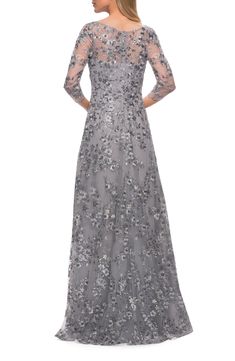 A silvery, sequin-set garden trails all over this exquisite gown, styled with a graceful ballet neckline and a fully swishable skirt. Style Name:La Femme Metallic Sequin & Lace A-Line Gown. Style Number: 6215441. Gray Gown For Mother Of The Bride, Fitted 3/4 Sleeve Gala Gown, Silver Long Sleeve Dress For Mother Of The Bride, Silver Floor-length Mother Of The Bride Dress For Gala, Floor-length Sequin Cocktail Mother Of The Bride Dress, Silver Sequined Floor-length Mother Of The Bride Dress, Silver Embellished Floor-length Sequin Dress, Wedding Pallet, Gray Embellished Floor-length Gown