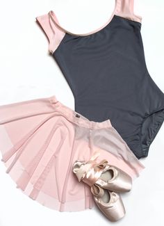 a ballet outfit and ballerina shoes on a white background