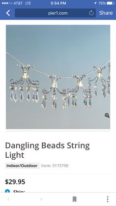 an image of a string of lights hanging from the ceiling