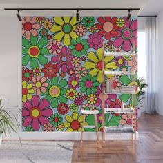 a colorful floral wall mural in a living room