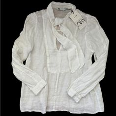 Bnwt Zara White Linen Boxy Blouse With Neck Tie. Size S. Brand New In Perfect Condition. Rrp $45.90 Classic White Zara Blouse, Chic White Linen Blouse, Zara Linen Tops For Daywear, Chic Linen Blouse By Zara, Chic Linen Zara Blouse, Elegant Linen Blouse By Zara, Zara Tops, White Linen, Neck Tie