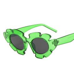 Look chic and eye-catching with the Vintage Flower Cat Eye Sunglasses. Featuring an alluring cut-out flower design and + more colors to choose from, these stylish sunglasses will add vibrancy and elegance to your look. Spring Party Cat Eye Sunglasses With Tinted Lenses, Green Sunglasses For Spring Vacation, Spring Party Cat Eye Tinted Sunglasses, Spring Party Cat Eye Sunglasses With Glass Lenses, Spring Party Cat Eye Sunglasses With Glass Material, Green Cat Eye Sunglasses For Parties, Spring Party Cat Eye Sunglasses, Trendy Glass Cat Eye Sunglasses For Spring, Trendy Cat Eye Sunglasses For Spring