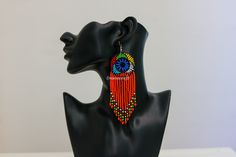 African zulu earrings, Beaded earrings, Fringe earrings, Tassel earrings, Boho earrings, Dangle earrings, Christmas gift for her. The earrings are light in weight and can compliment any outfit. Color: Orange Free shipping for additional items in your cart. Traditional Beaded Tassel Earrings As Gift, Traditional Beaded Tassel Earrings For Gift, Traditional Beaded Chandelier Earrings As Gift, Traditional Tassel Earrings With Dangling Beads As Gift, Traditional Dangle Beaded Earrings As Gift, Traditional Chandelier Earrings With Colorful Beads As Gift, Traditional Tassel Earrings With Round Beads, Zulu Earrings, Earrings Tassel