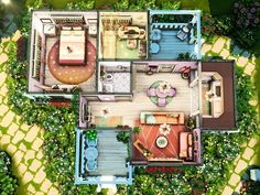 an aerial view of a house with lots of furniture and decor on the top floor