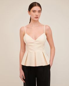 Emily Pleated Peplum Top | MARISSA WEBB Chic Sleeveless Top With Fitted Bodice, Chic Fitted Bodice Sleeveless Tops, Chic Fitted Peplum Top, Fitted Pleated Top For Day Out, Spring Evening Peplum Top, Fitted Elegant Peplum Top For Work, Elegant Fitted Peplum Top For Work, Elegant Structured Tops For Summer, Elegant Structured Summer Tops