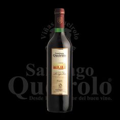 a bottle of wine on a black background with the words quieroro written in spanish