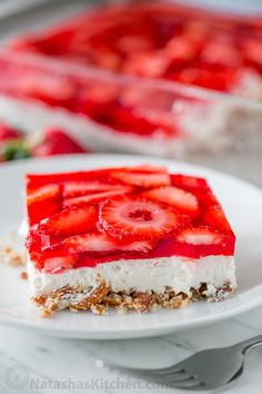 a slice of strawberry cheesecake on a plate