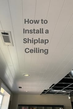 a ceiling with the words how to install a shiplap ceiling in white letters