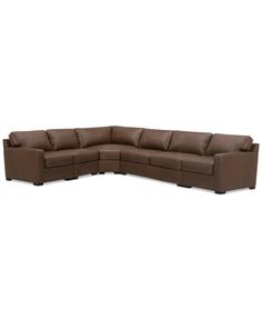 a brown leather sectional couch on a white background