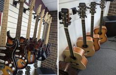 guitars are lined up against the wall and on display