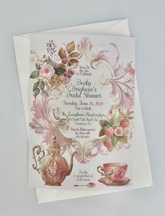 an elegant tea party bridal shower with pink flowers and gold accents on white paper